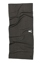 Back Facing image of Northwest Nomadix beach towel- solid grey print. Available for purchase on The Conservationist. 